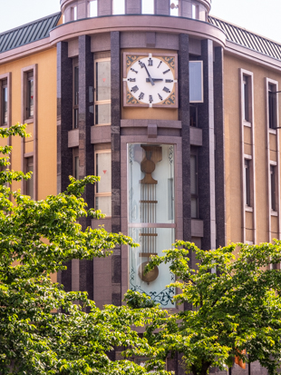 Pendulum clock exterior to Time Piece Museum