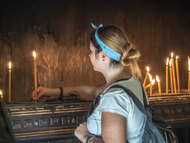 Burning Beeswax Candles in an Orthodox Church